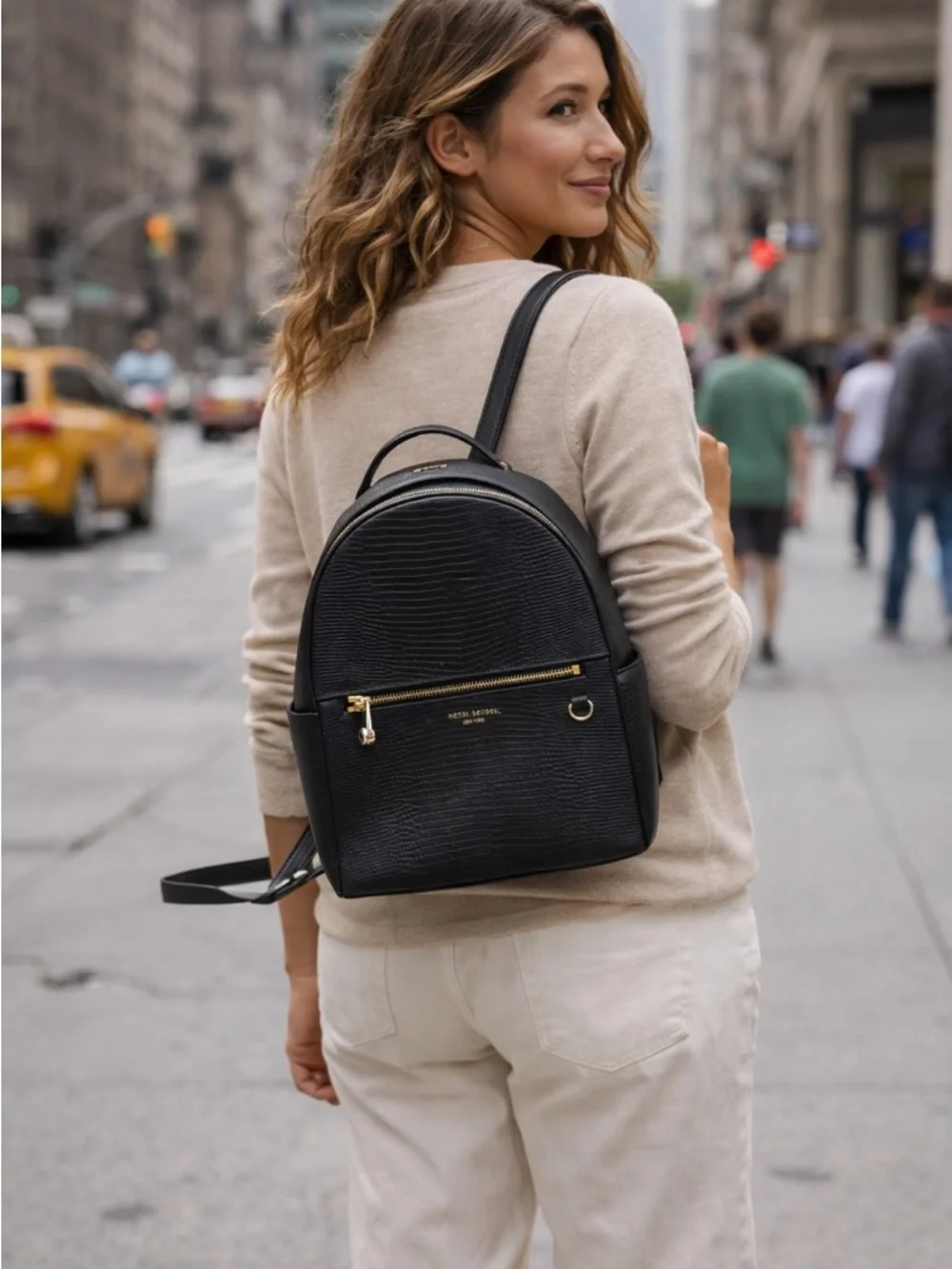 Henri Bendel Black Reptile Embossed Leather Backpack Structured Bag quiet luxury